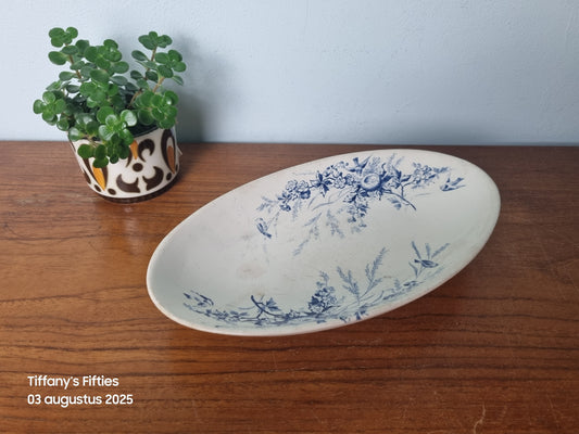 Ovaal schaaltje blauwe bloemen en vogel