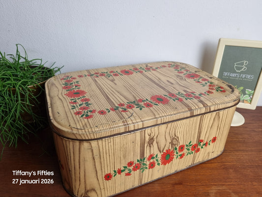 Groot blik Cote d'Or rode bloemen