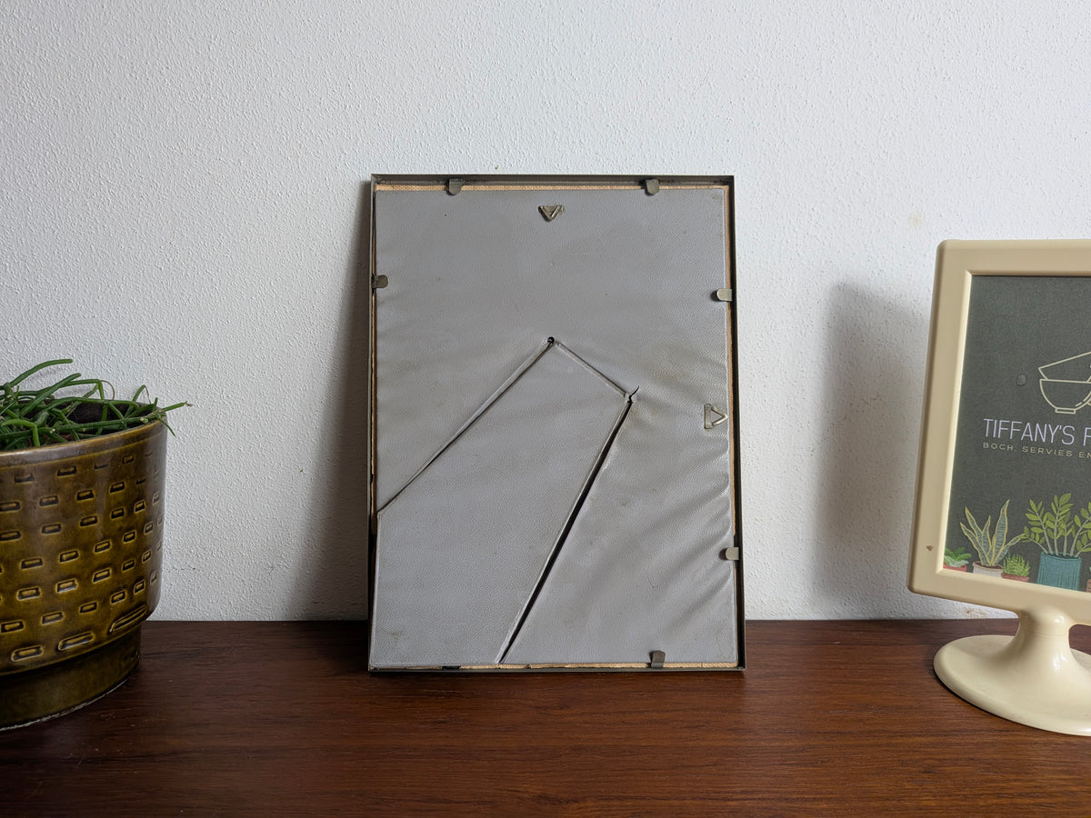 Vintage fotolijst met bol glas